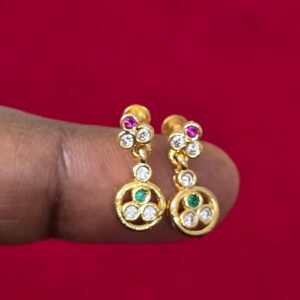 Pair of Pure Panchaloham gold-toned earrings featuring floral detailing, sparkling white stones, pink and green gemstone accents, and circular drop pendants